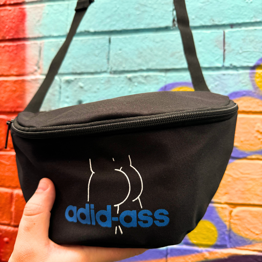 Man holding an Adid-ass bum bag